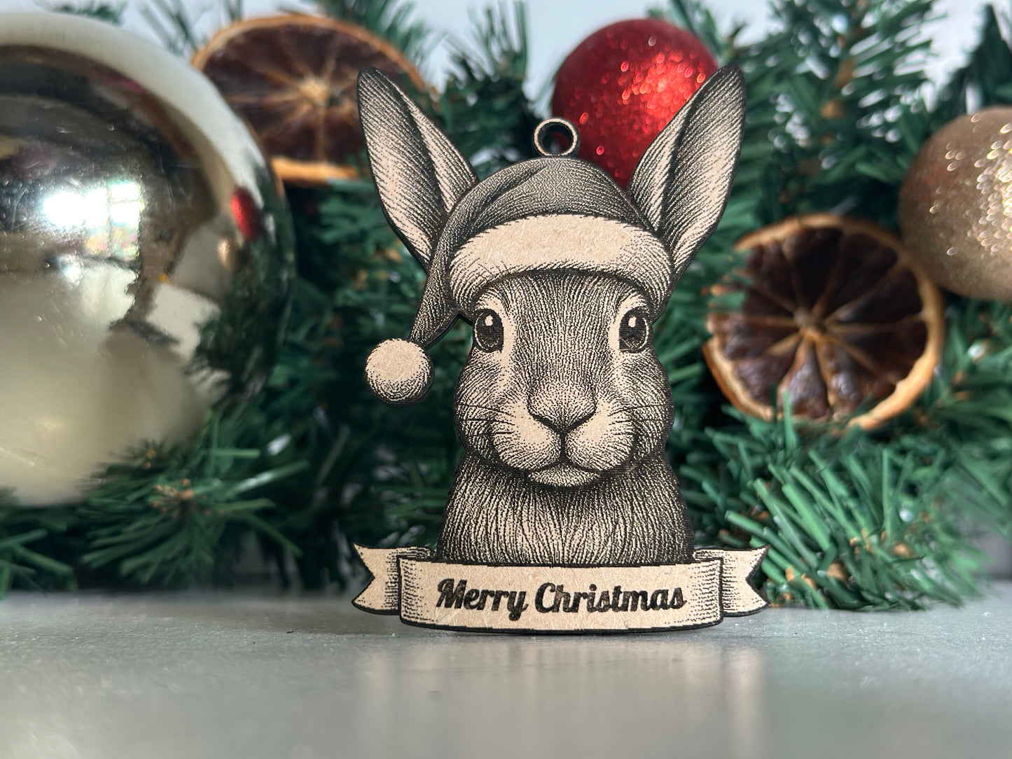 Decorative ornament with a Hare design on a Christmas tree.