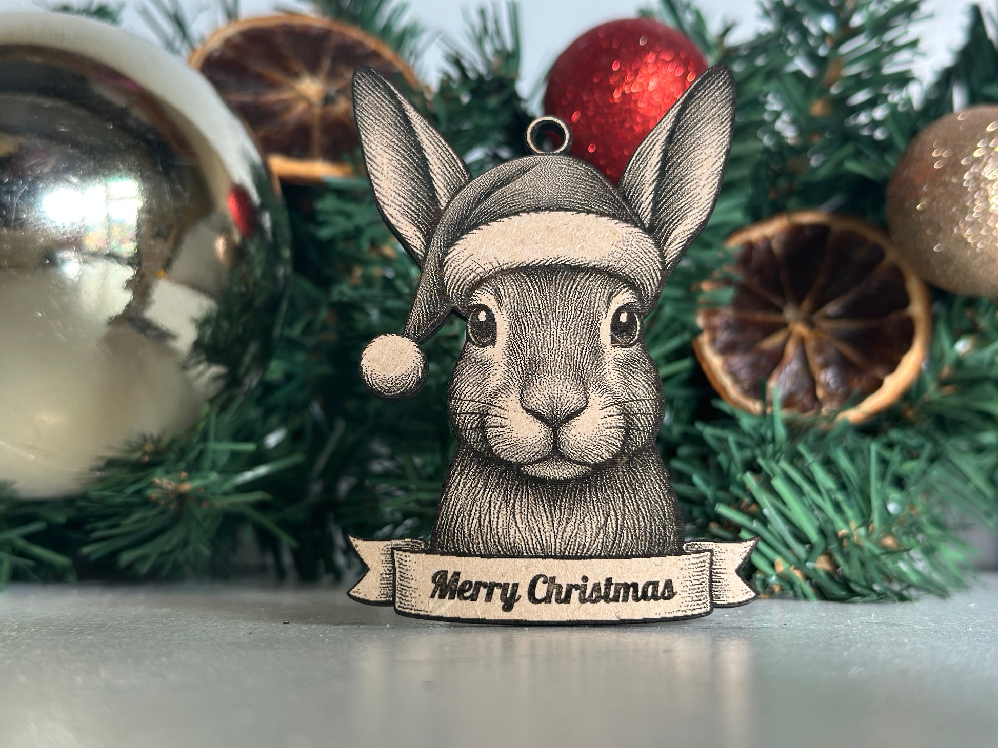 Decorative ornament with a Hare design on a Christmas tree.