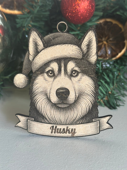 Decorative husky ornament with 'Husky' text on a Christmas tree.