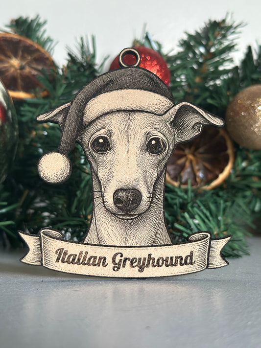 Decorative ornament of a Italian Greyhound dog with a Santa hat on a Christmas tree.