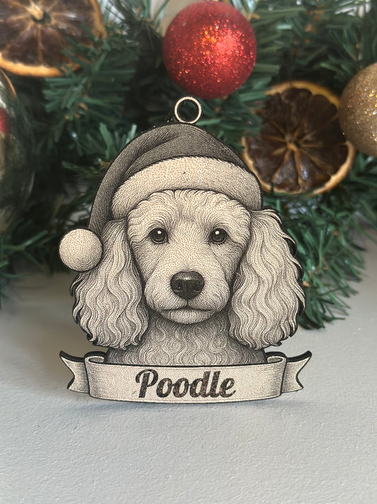 Decorative poodle ornament with a banner labeled 'Poodle' against a Christmas tree background.