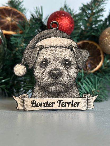 Ornament with a border terrier design on a Christmas tree.