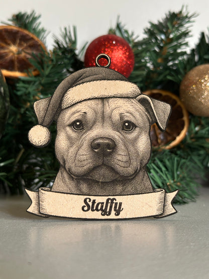 Dog ornament with 'Staffy' on a Christmas tree