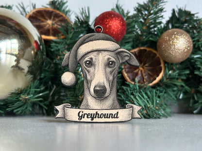 Decorative reindeer ornament with 'Greyhound' text on a Christmas tree.