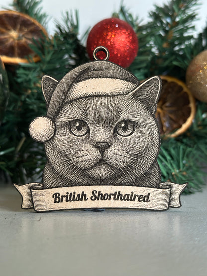 Decorative ornament with a British Shorthair cat design on a Christmas tree.