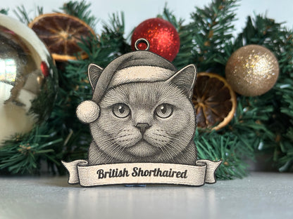 Decorative Christmas ornament with a british shorthaired cat design and festive elements on a green background.