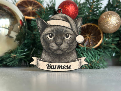 Decorative burmese ornament with a banner on a Christmas tree.