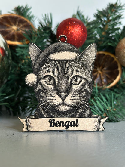 Decorative ornament with a bengal cat design on a Christmas tree.