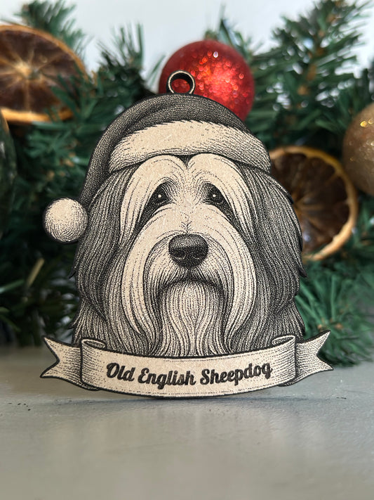 Decorative Christmas ornament with a dog's face and 'Old English Sheepdog' text on a green wreath.