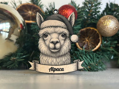 Decorative ornament of an alpaca wearing a Santa hat with Christmas decorations in the background.