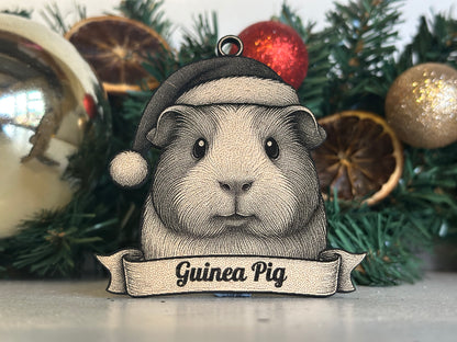 Decorative ornament of a guinea pig with a sign on a Christmas decoration