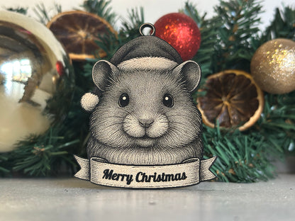 Decorative Christmas ornament with a hamster wearing a Santa hat on a tree.