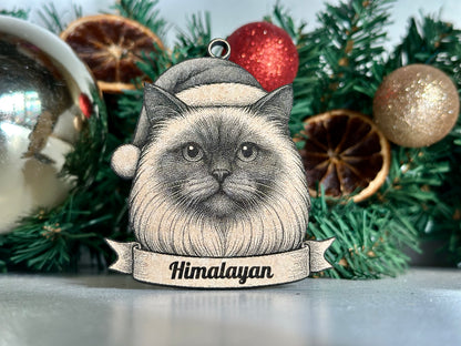 Cat ornament with 'Himalayan' label against a Christmas-themed background