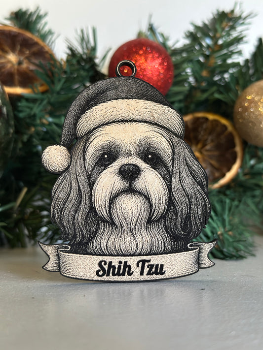 Decorative ornament with a stylized face and 'Shih Tau' text on a Christmas tree.