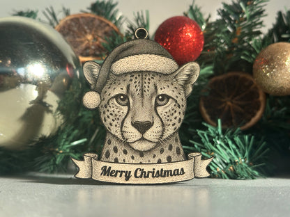 Decorative Christmas ornament with a cheetah design and 'Merry Christmas' banner on a tree.