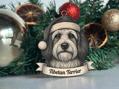 Decorative Tibetan Terrier ornament with a Santa hat against a Christmas tree background.
